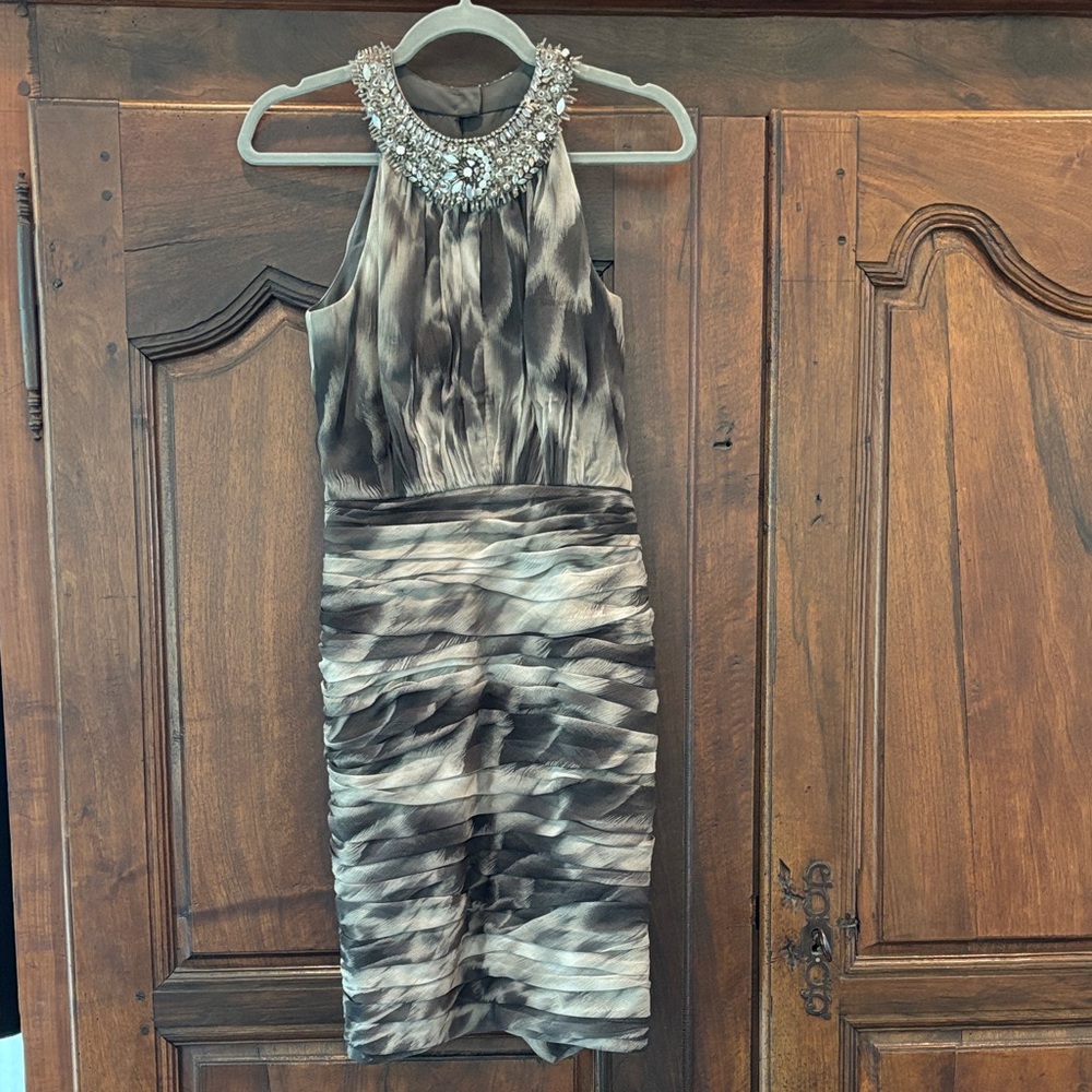 Elegant Sleeveless Dress with Beaded Neckline